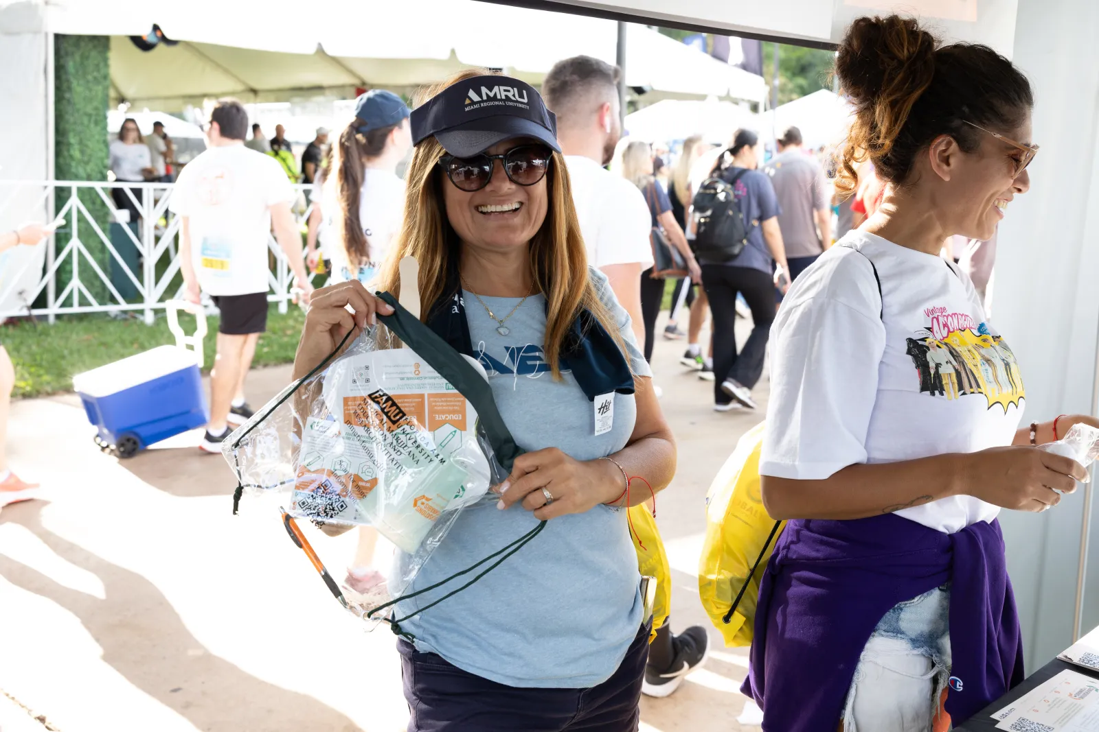 a person holding a bag of food