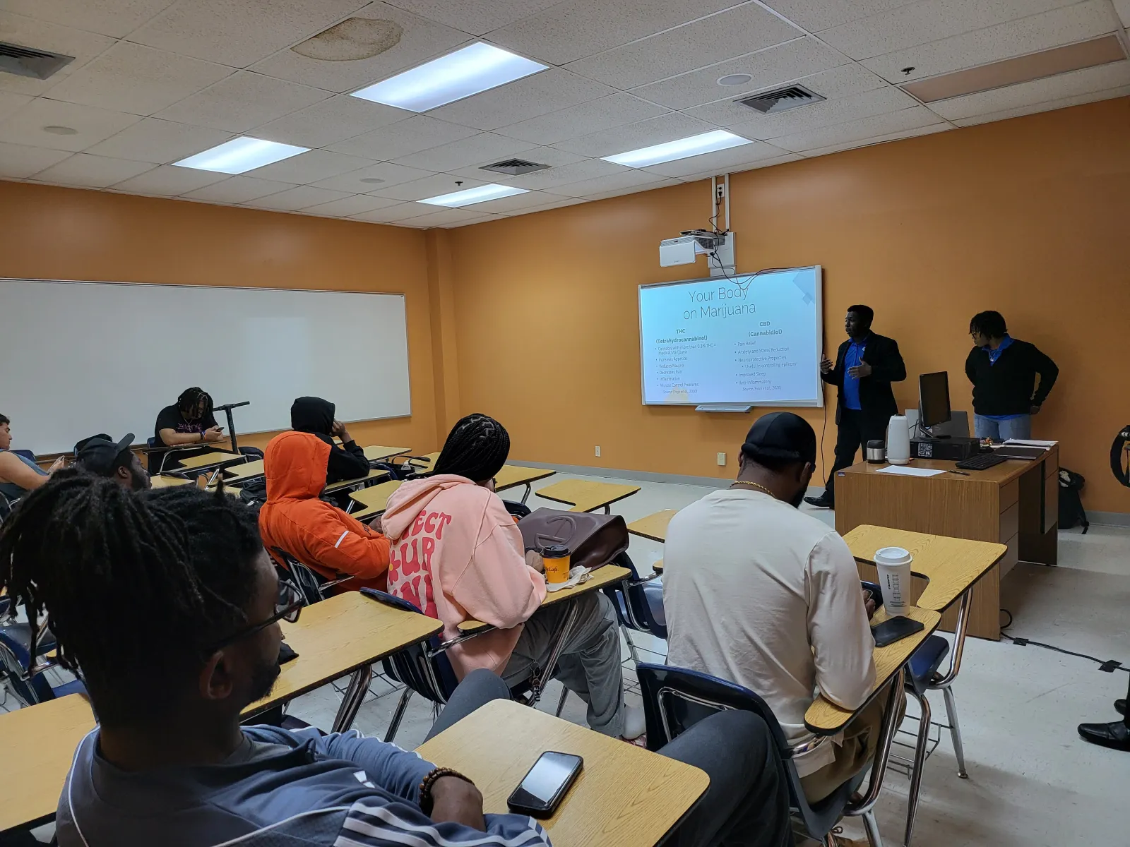 a group of people in a classroom