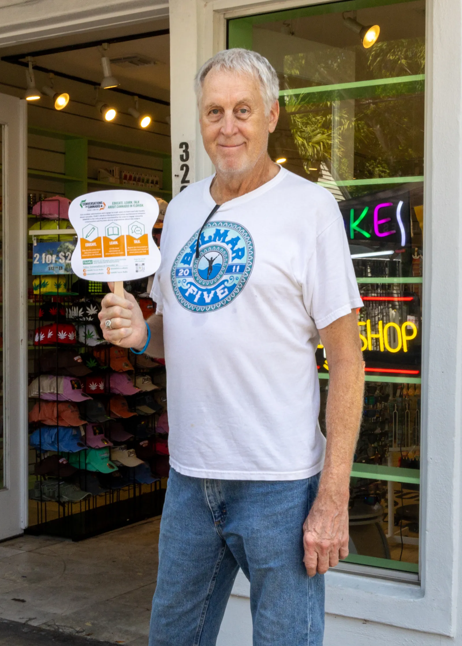 a man holding a sign