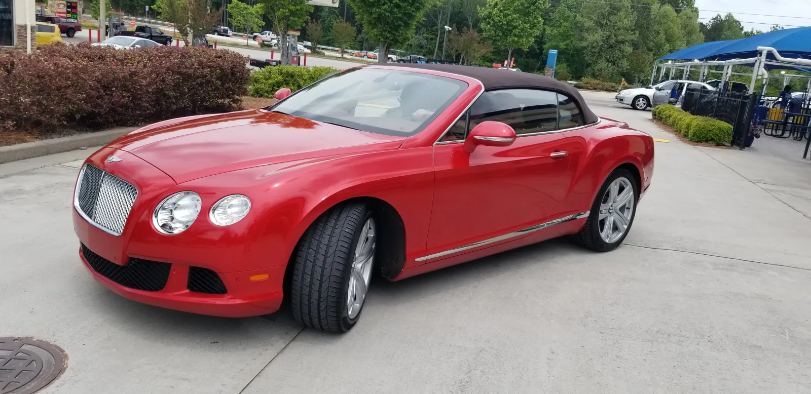 a red car parked on a street