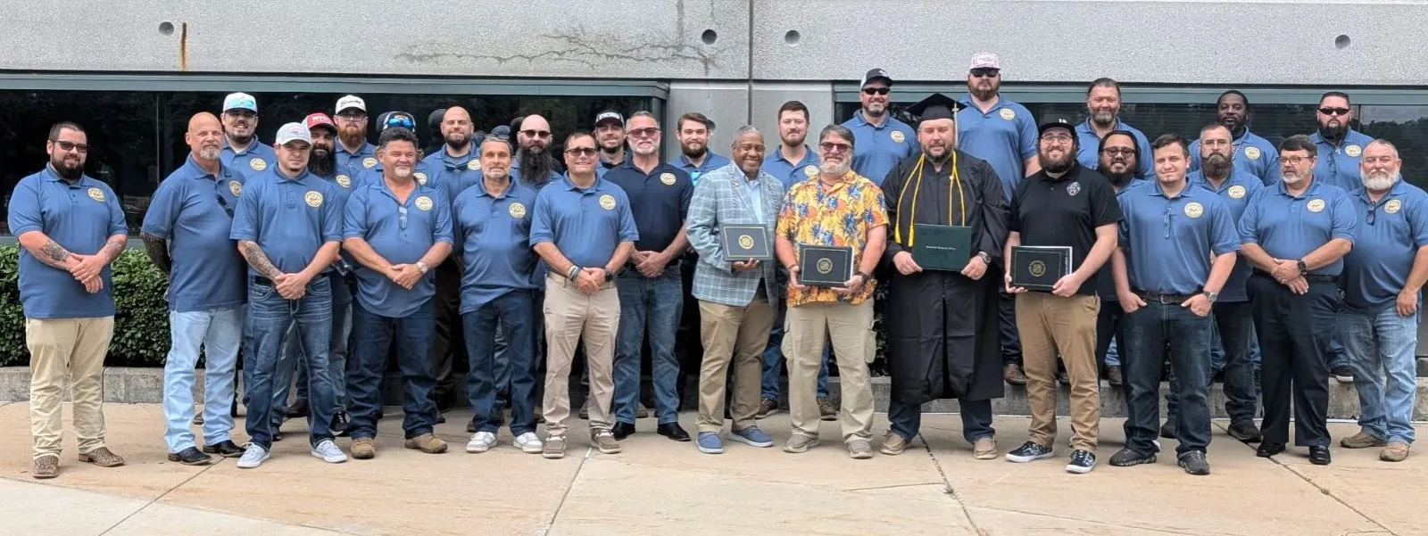 a group of men posing for a photo