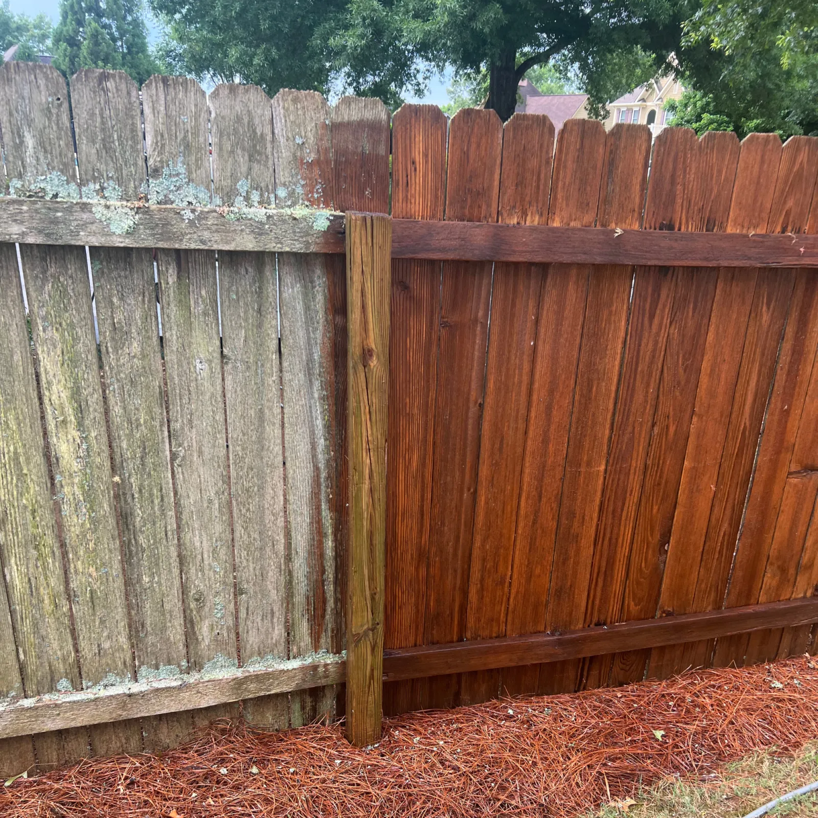 a wooden fence with a wooden gate