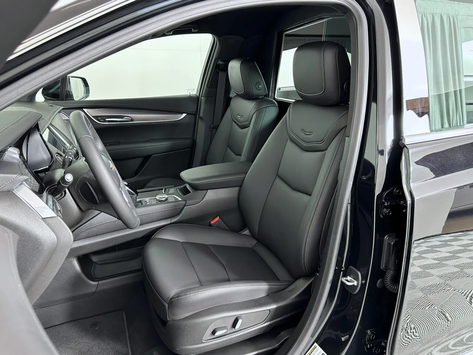 Luxurious car interior with sleek leather seats and modern dashboard design.