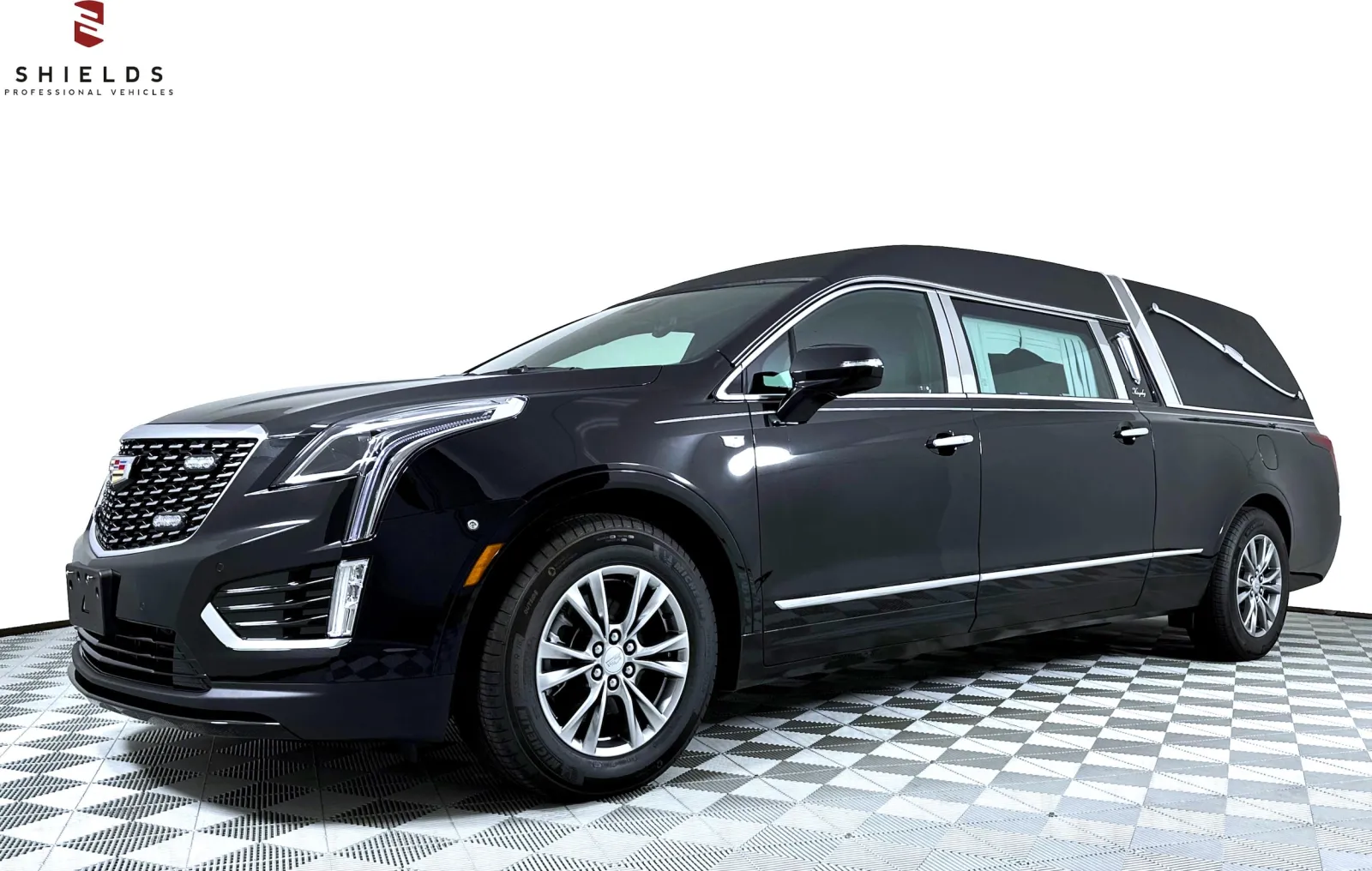 Elegant black hearse showcasing luxurious design and sleek lines, perfect for professional services.