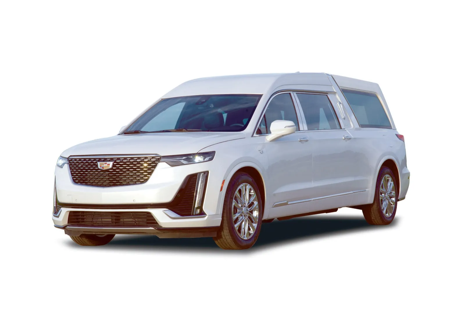 White Cadillac SUV with a long, sleek design, showcasing luxury and modern styling.