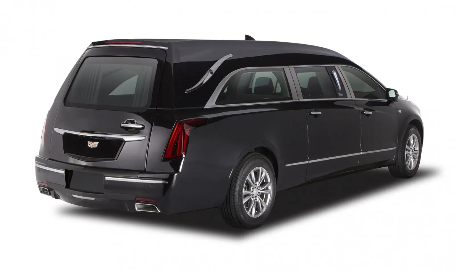 A sleek black Cadillac hearse showcasing elegant design and modern features from a side view.