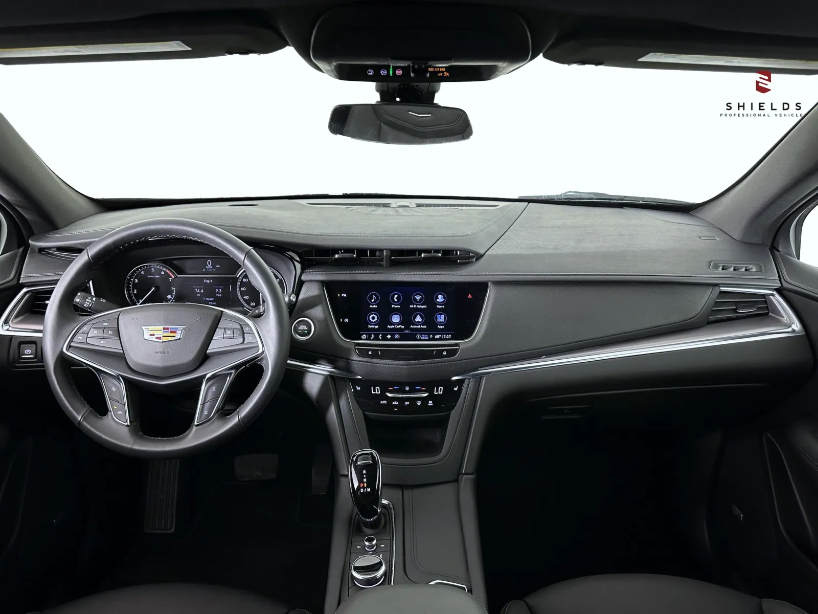 Modern Cadillac dashboard featuring advanced technology and sleek design elements.