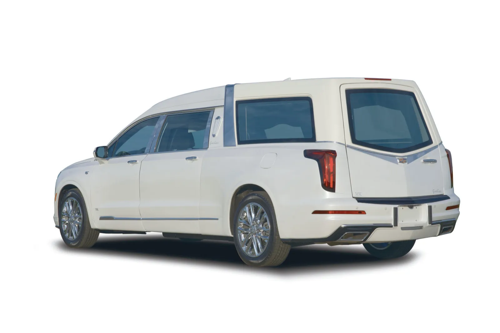 Elegant white hearse with classic design, showcasing luxury and refinement in vehicle style.