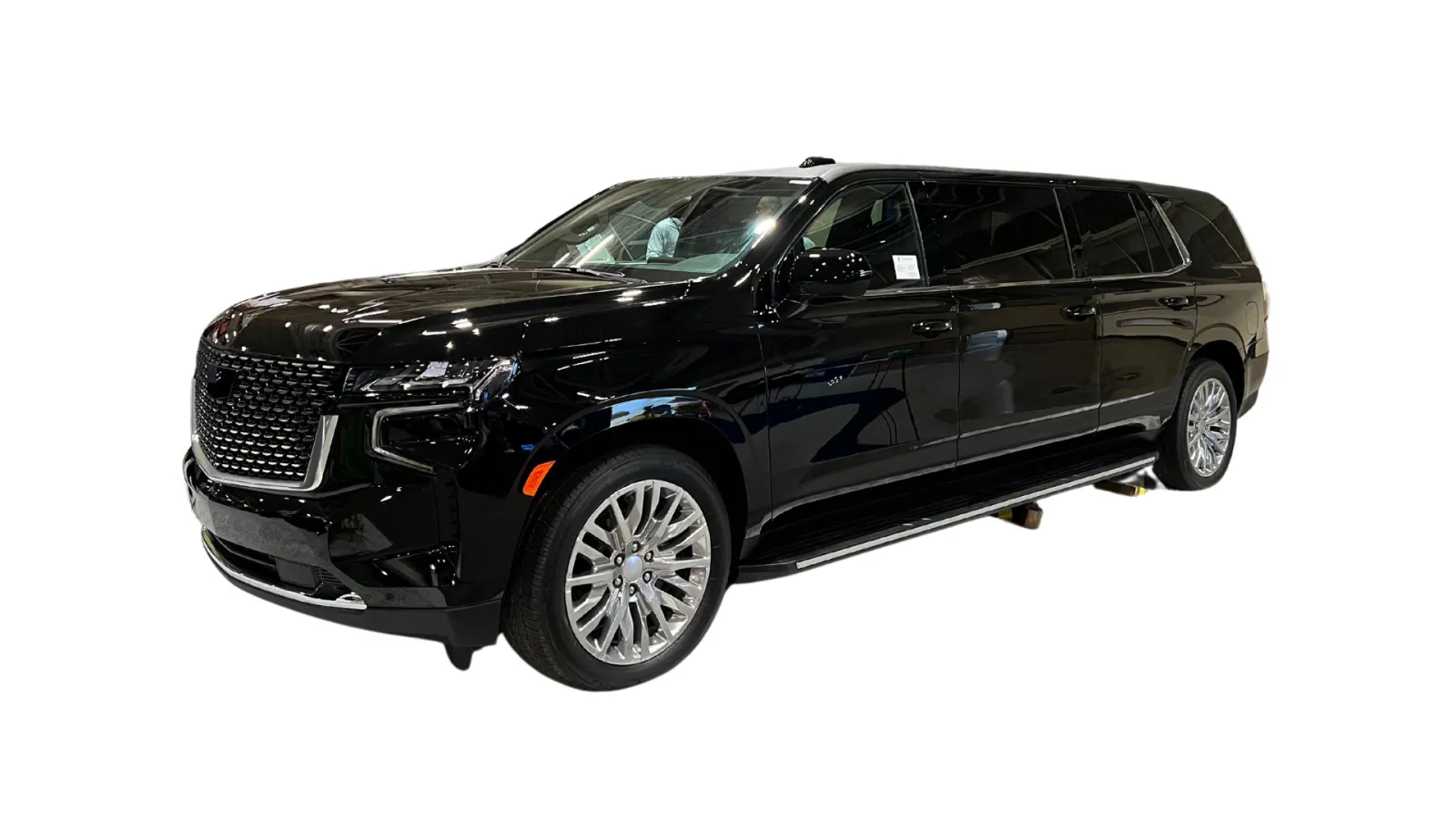 Sleek black luxury SUV with chrome accents and spacious design, showcasing modern automotive engineering.