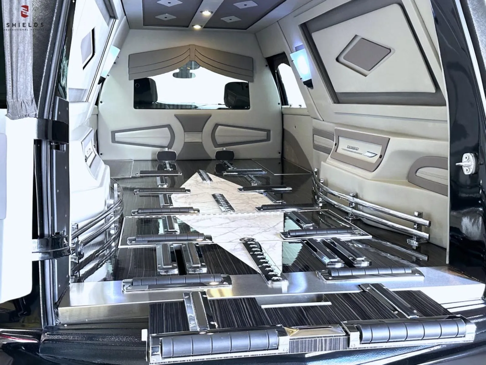 Interior of a luxury vehicle featuring sleek design and spacious seating.