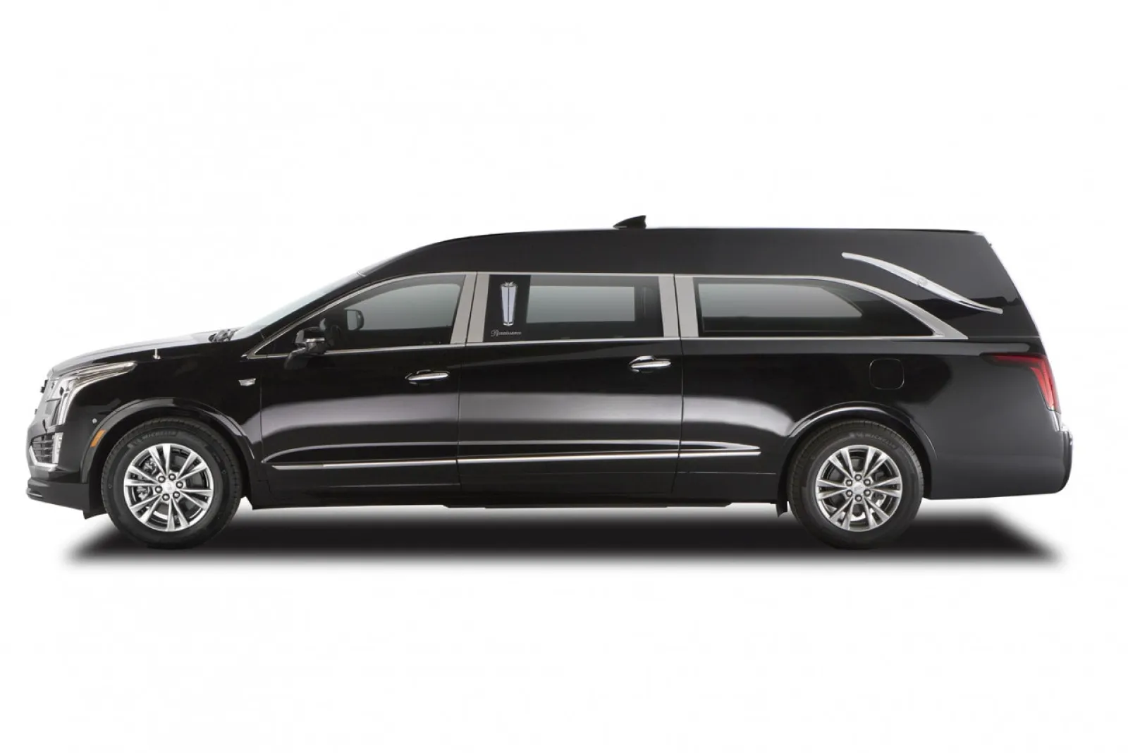 Sleek black luxury limousine showcasing modern design and spacious interior.