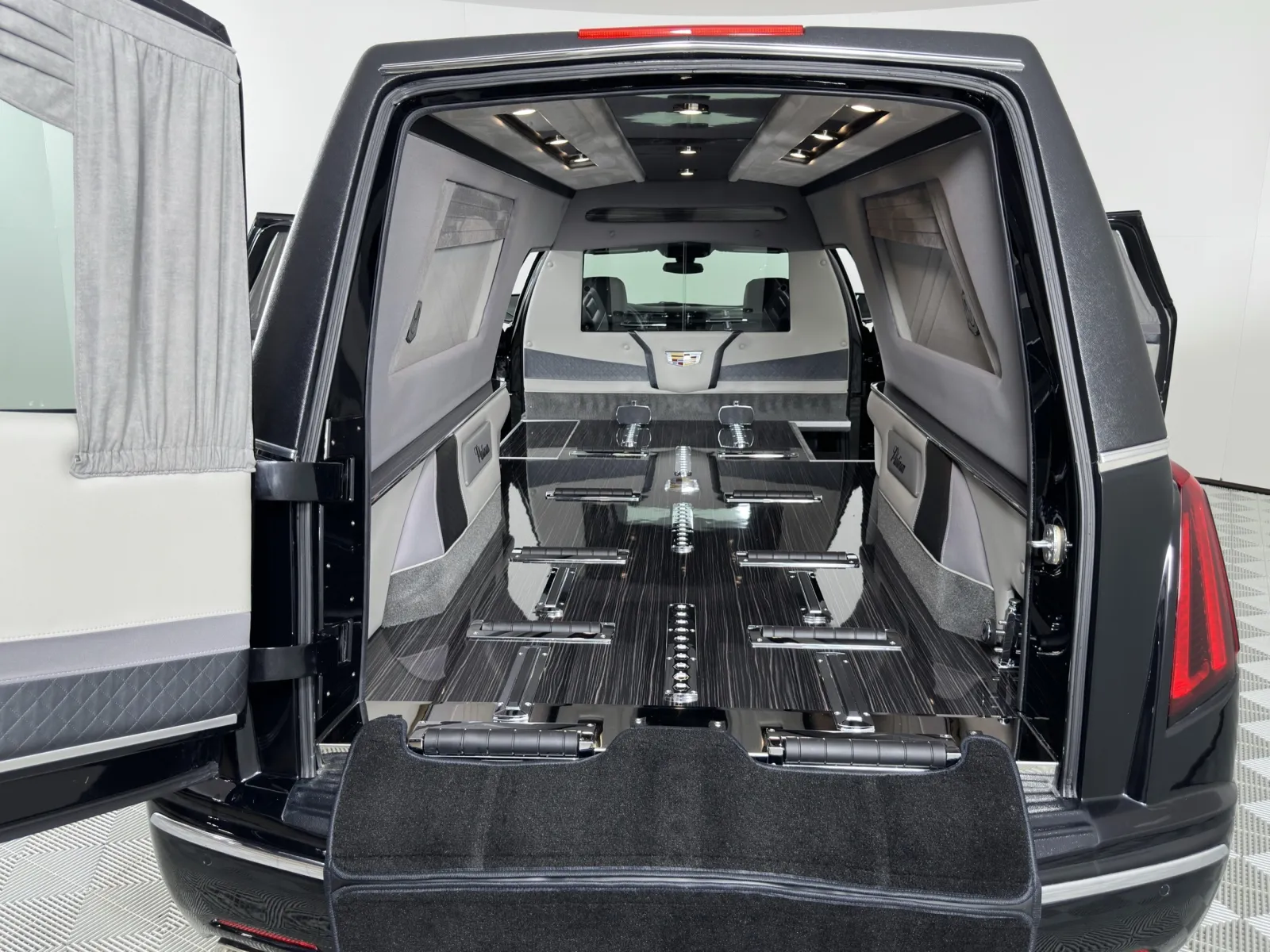 Interior view of a luxury hearse showcasing elegant design and spacious layout.