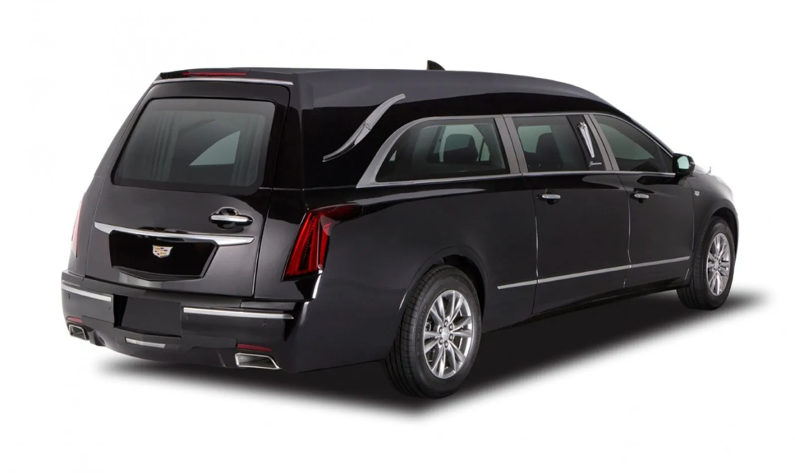 Luxurious black Cadillac hearse with sleek design and elegant details, ideal for transportation services.