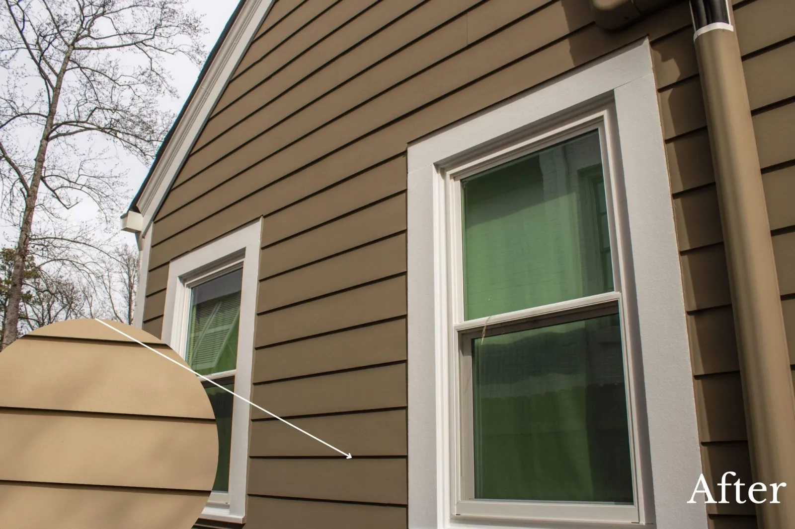Freshly installed light brown horizontal siding with white‑trimmed windows and improved curb appeal after exterior renovation in Atlanta