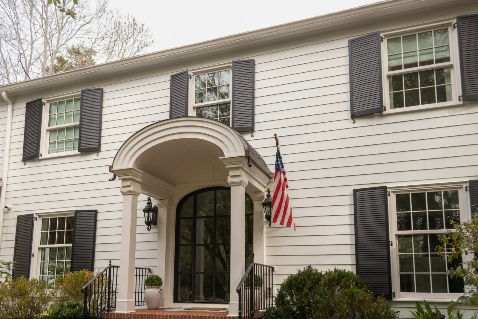 Traditional home upgraded by Nelson Exteriors with fiber cement siding replacement in Marietta GA