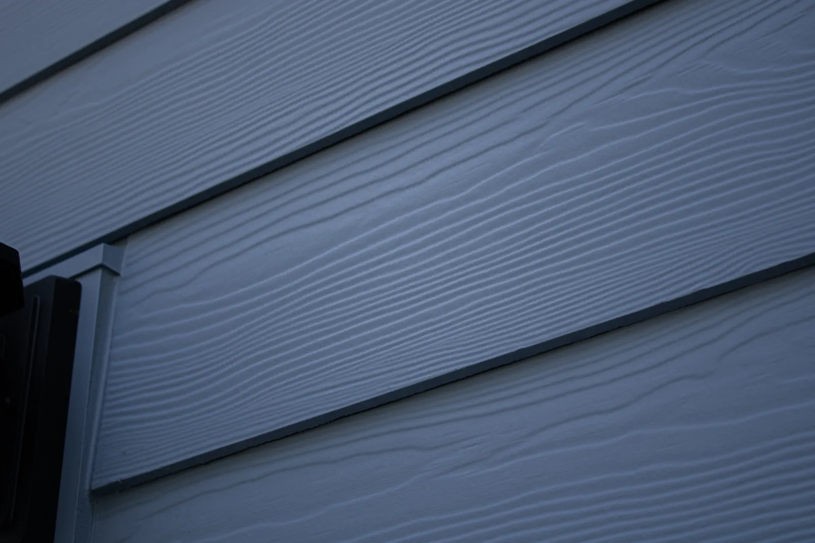 Close-up of Nelson Exteriors fiber cement siding texture and durable exterior finish in Marietta GA