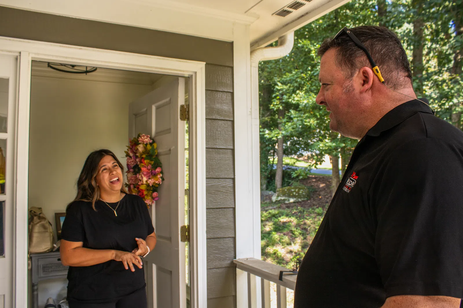 A contractor repairing damaged fascia and roof decking in compliance with exterior remodeling permit requirements Marietta GA, residential exterior remodeling in Marietta by Nelson Exteriors.