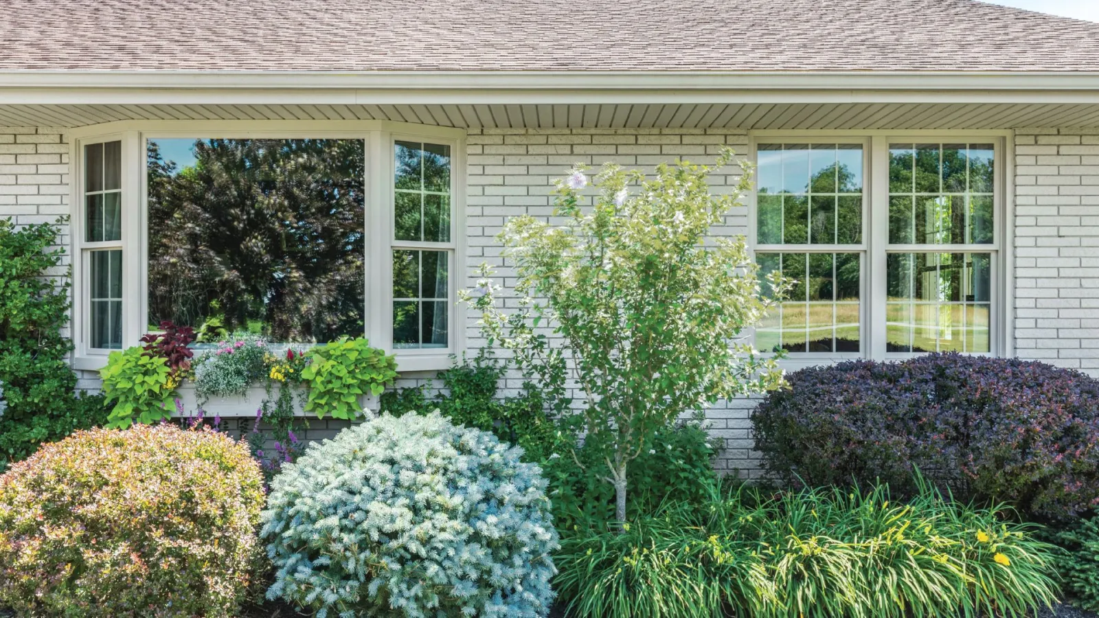 Home windows with grilles between the glass.