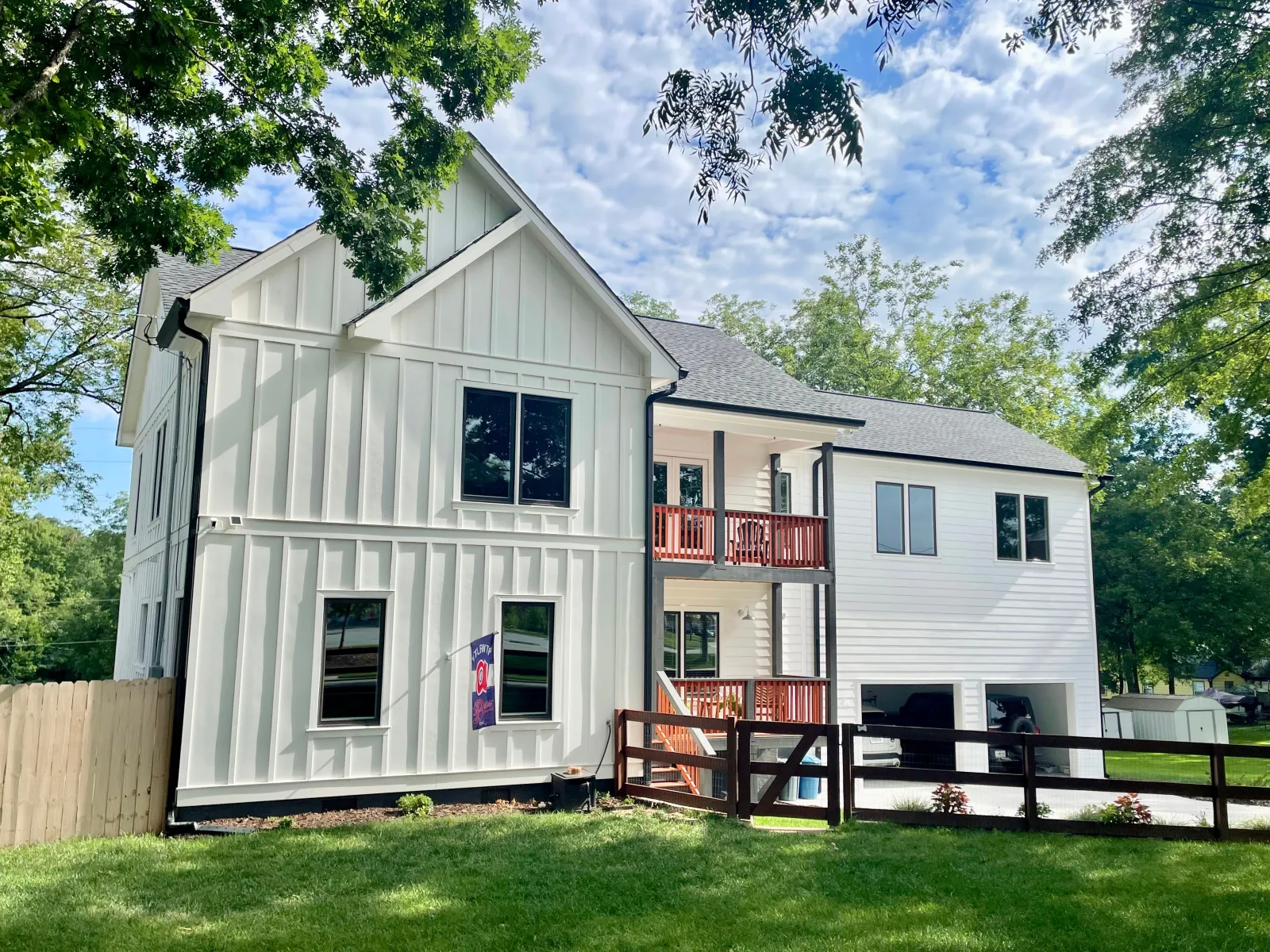 a white house with a fence