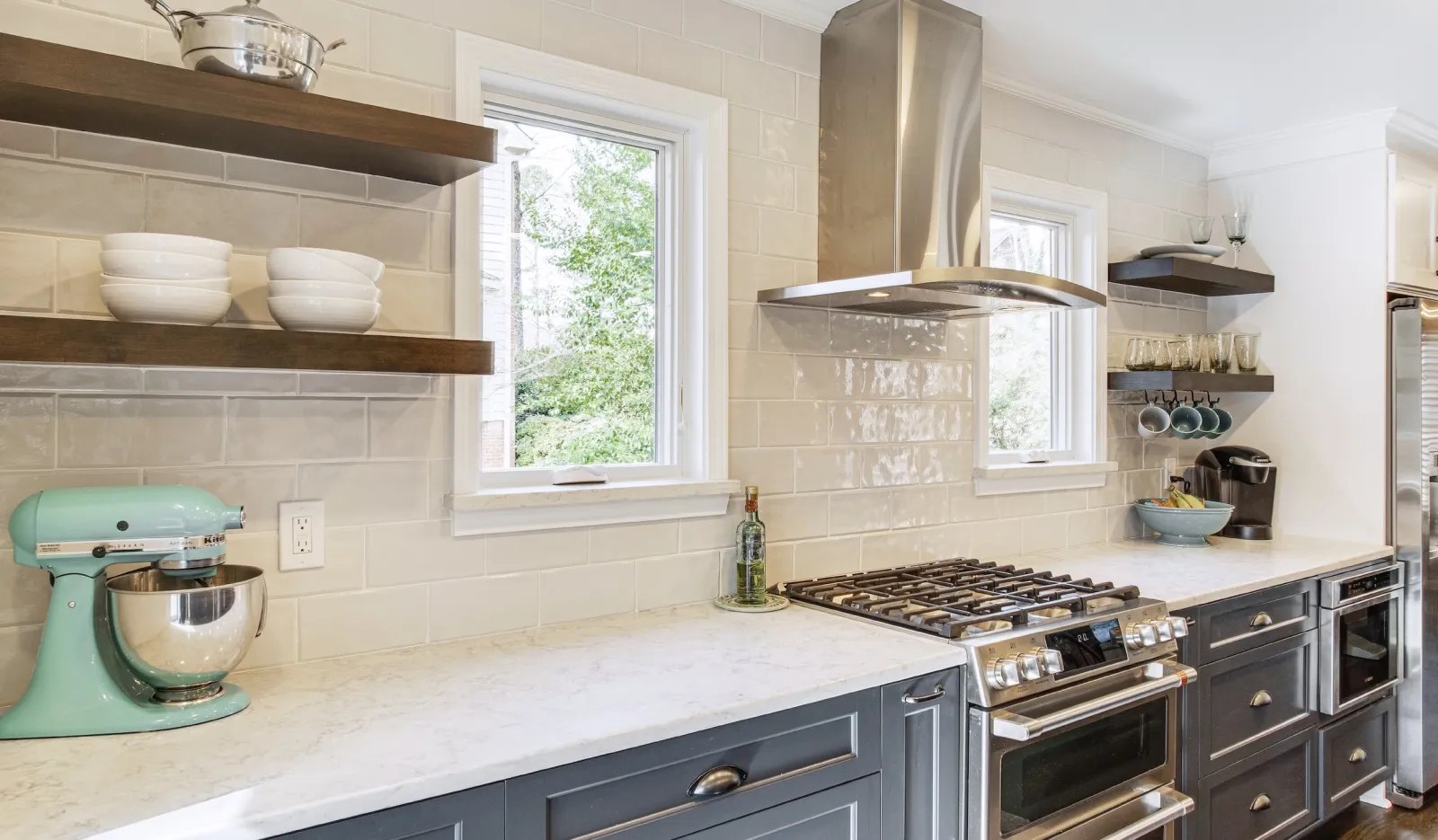 White fiberglass casement window replacement in a kitchen