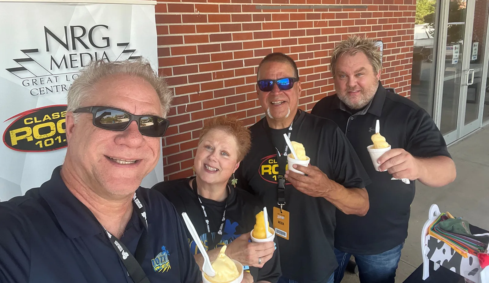 a group of people holding drinks