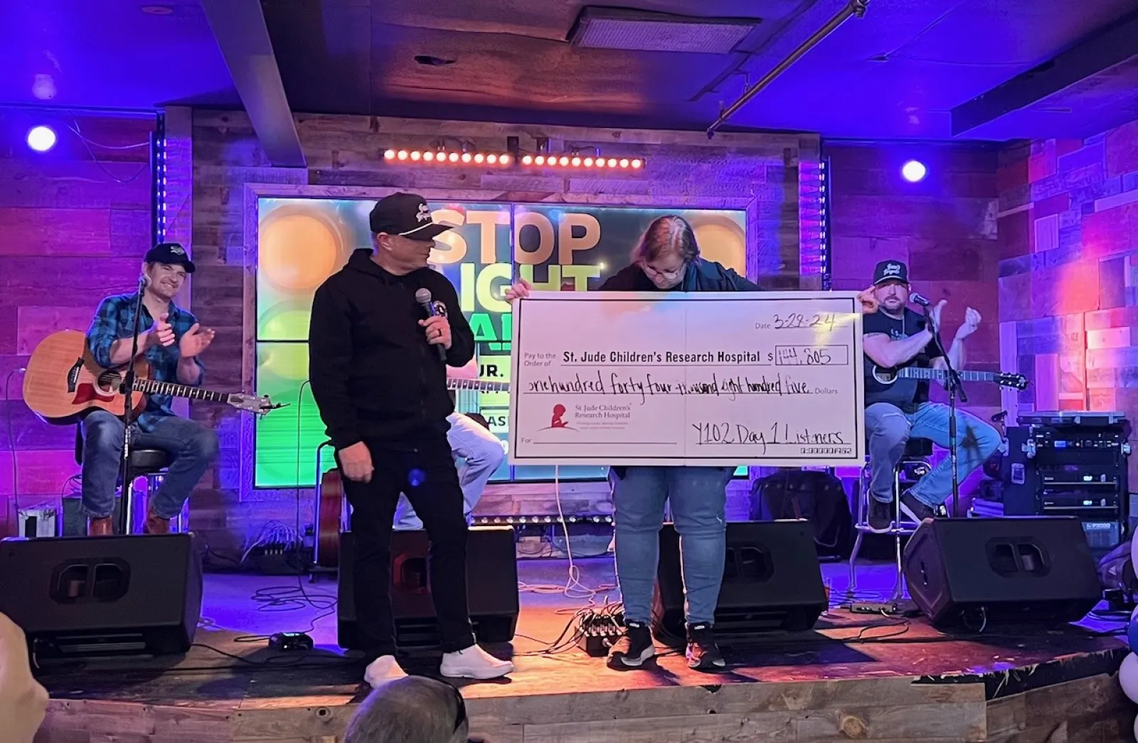 a group of people on a stage