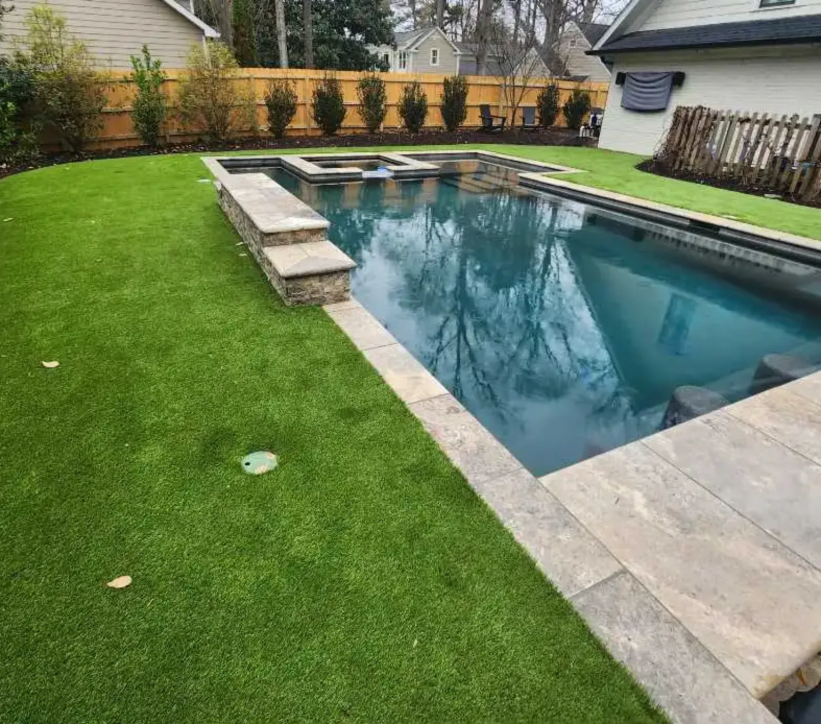 a pool in a backyard