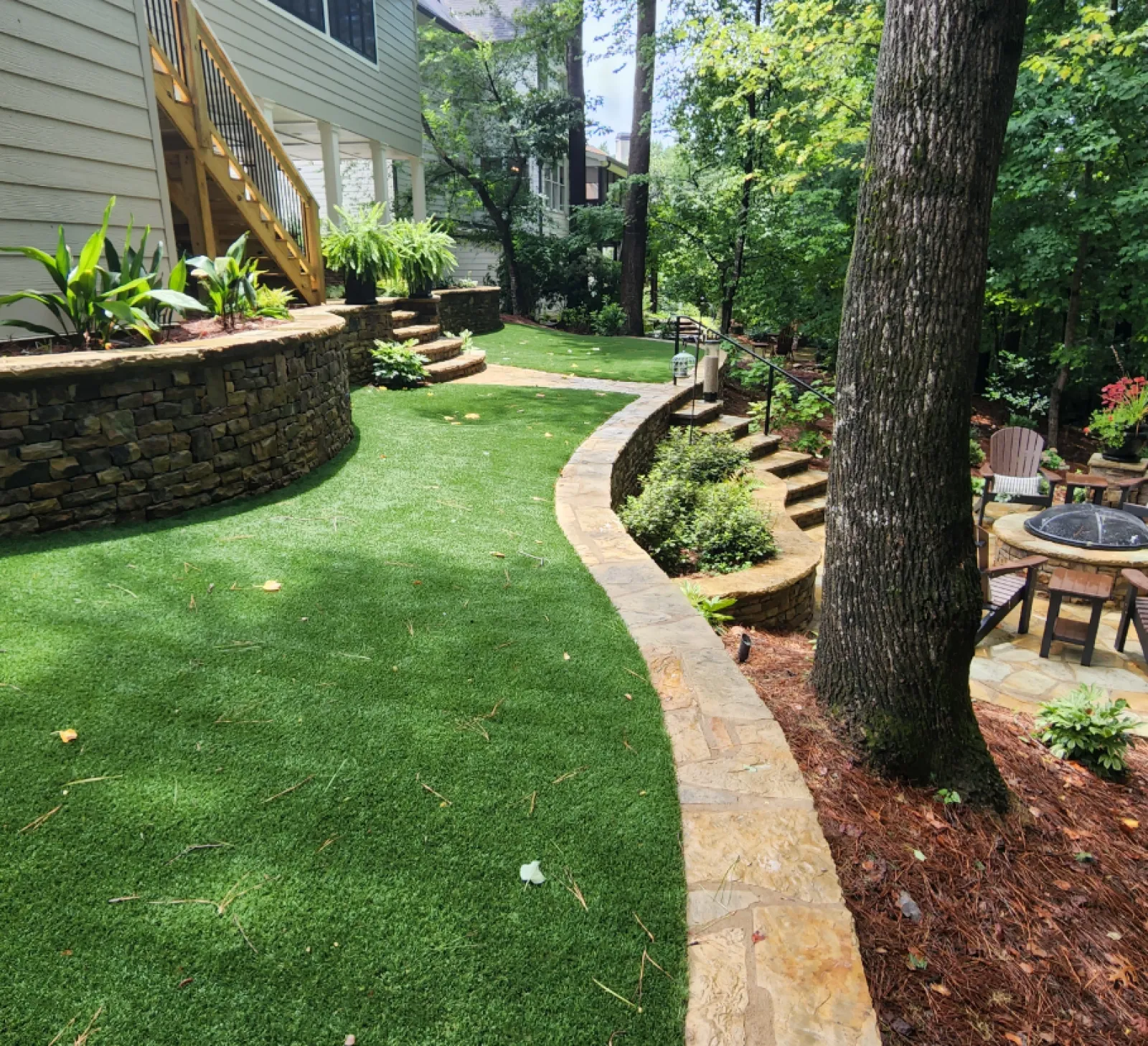 a small backyard with a small path