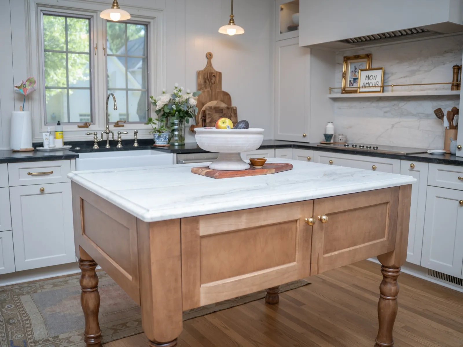 a kitchen with white cabinets