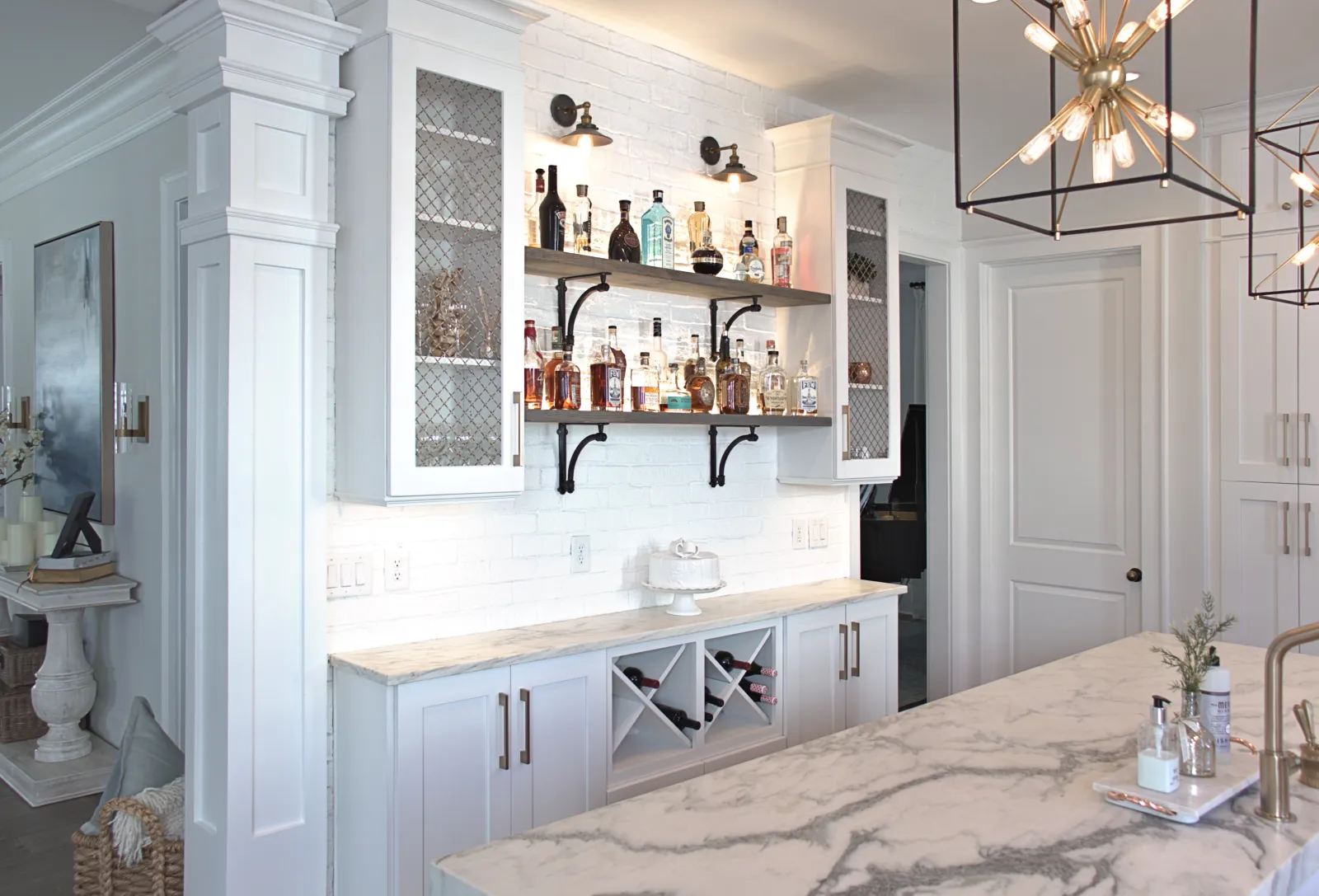 a kitchen with white cabinets