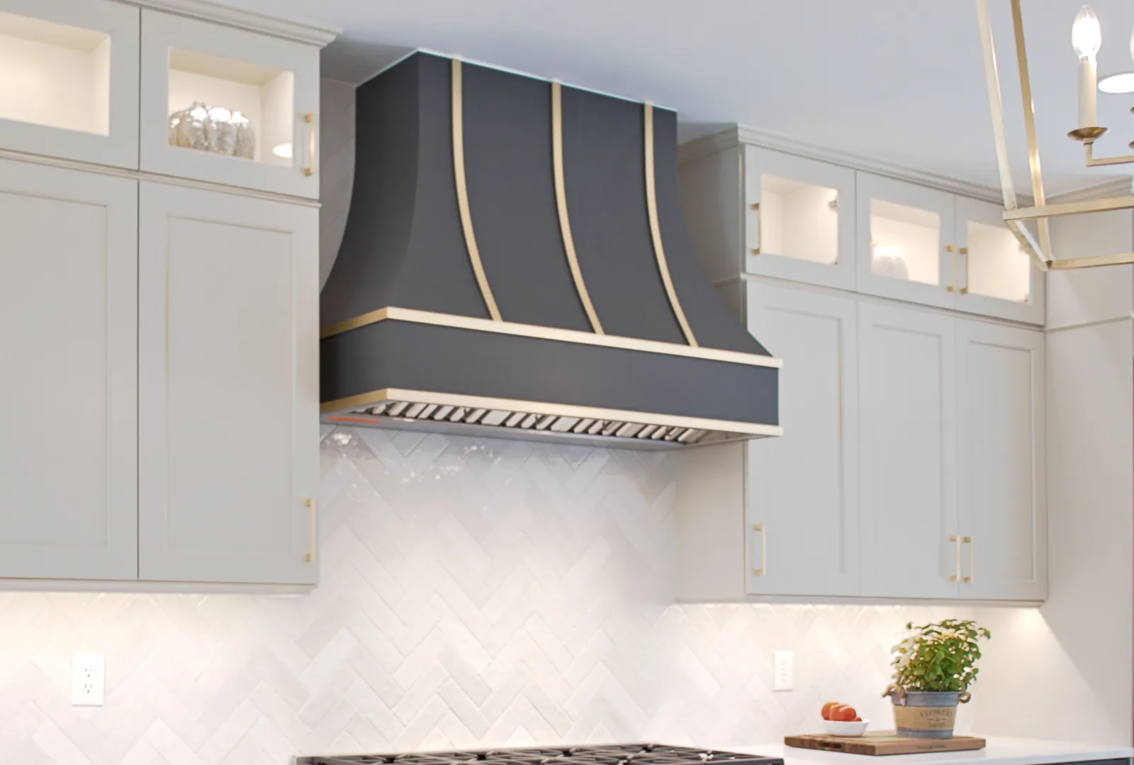 a kitchen with white cabinets