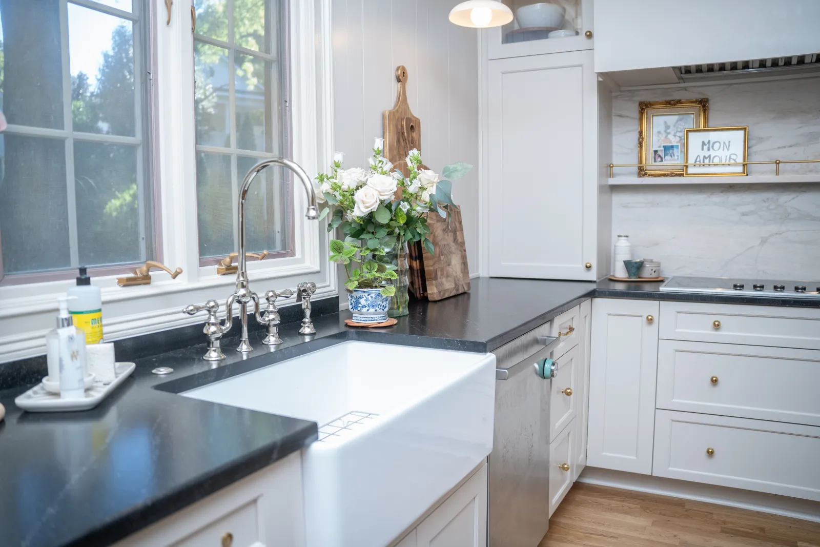 a kitchen with a sink and a window