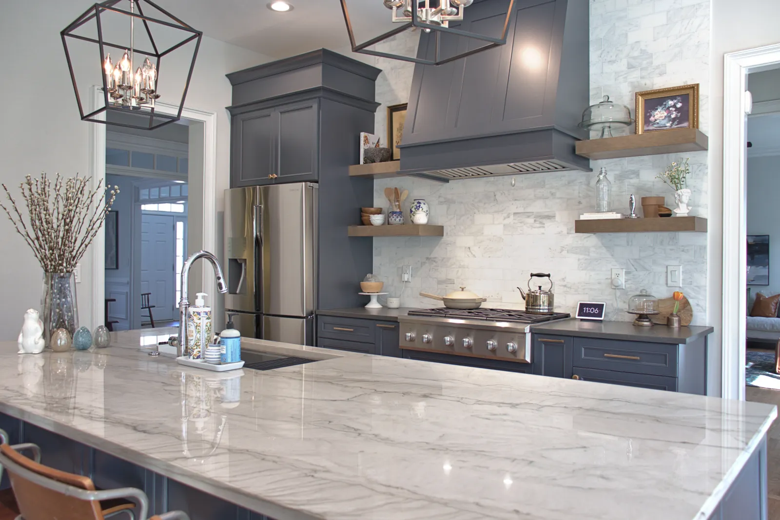 a kitchen with a marble counter top