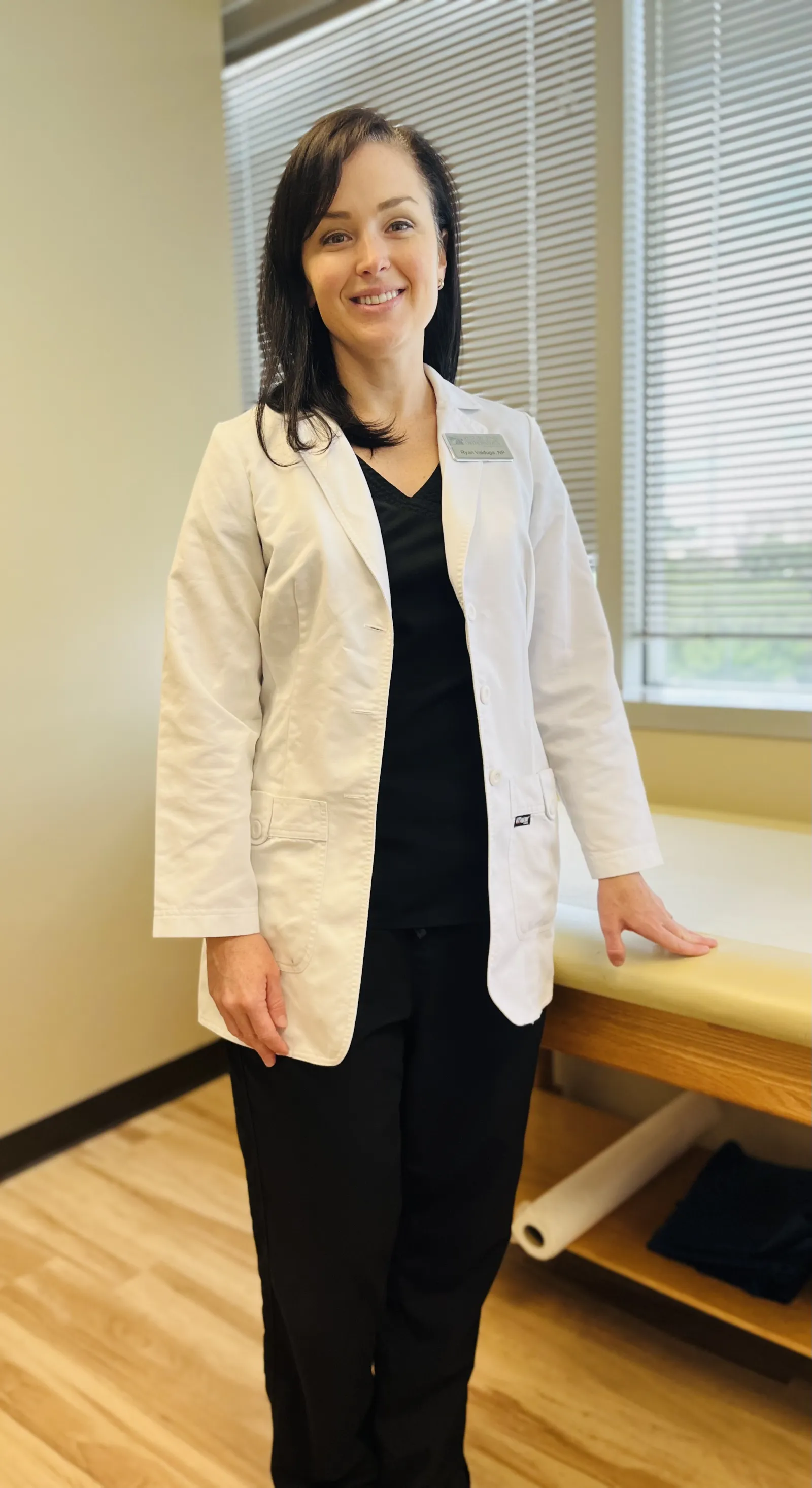 Nurse practicioner Ryan Valduga poses in an exam room.