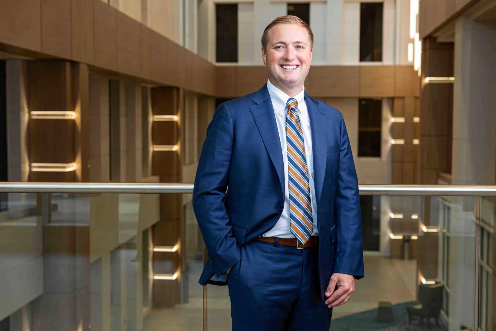 Dr. Jonathan D. Gillig poses in the lobby of an office building.