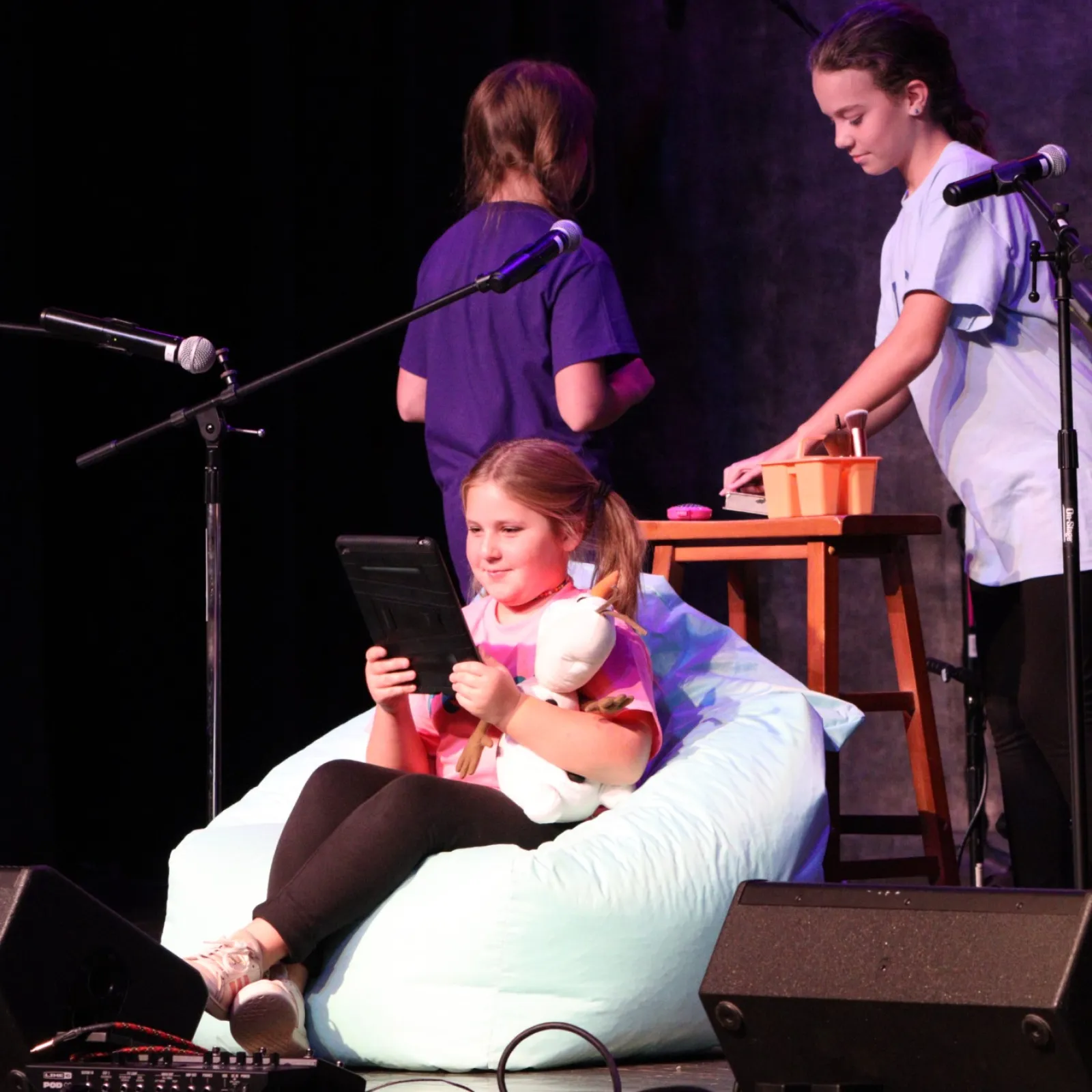 a group of people on a stage