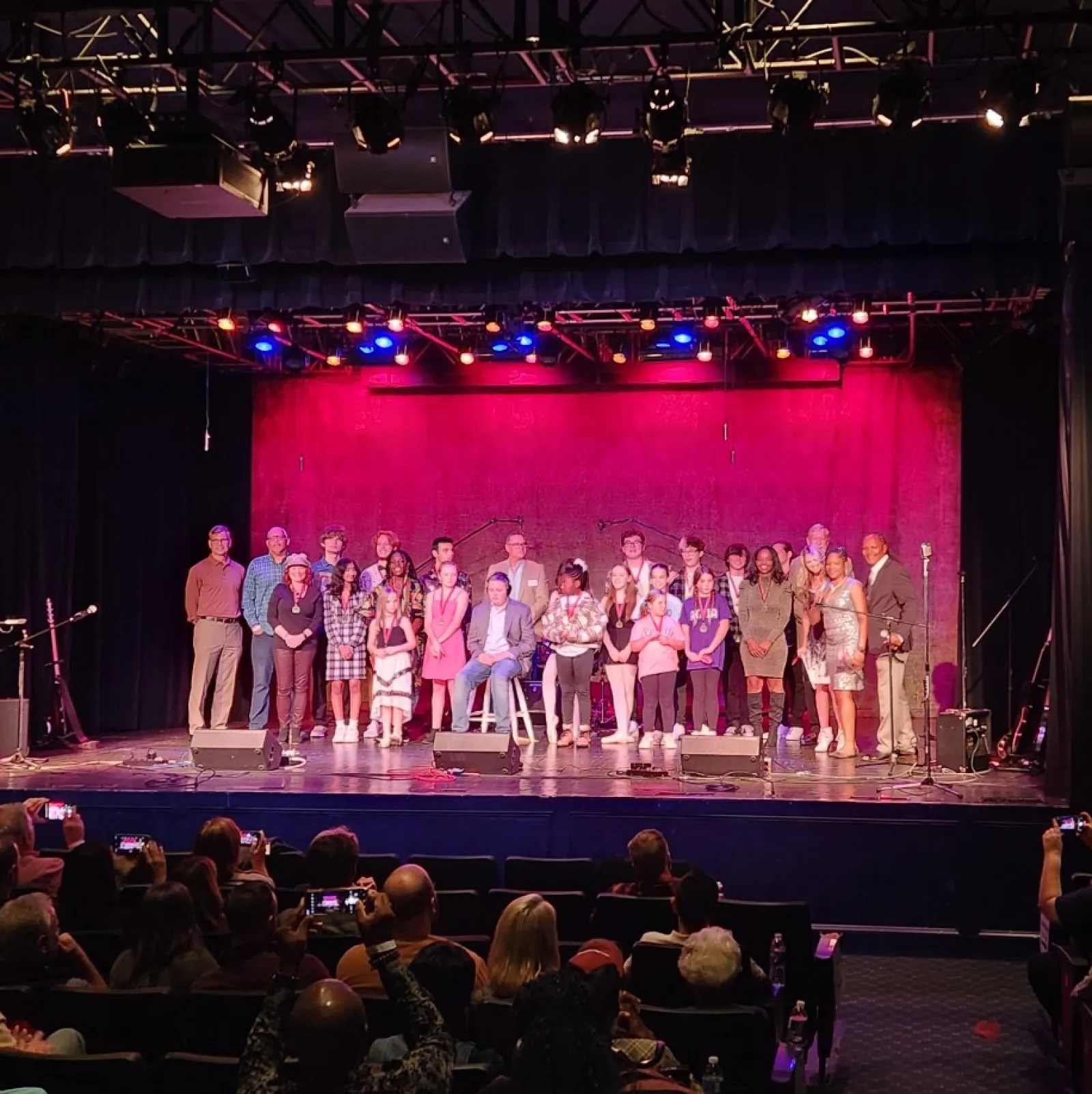 a group of people on a stage