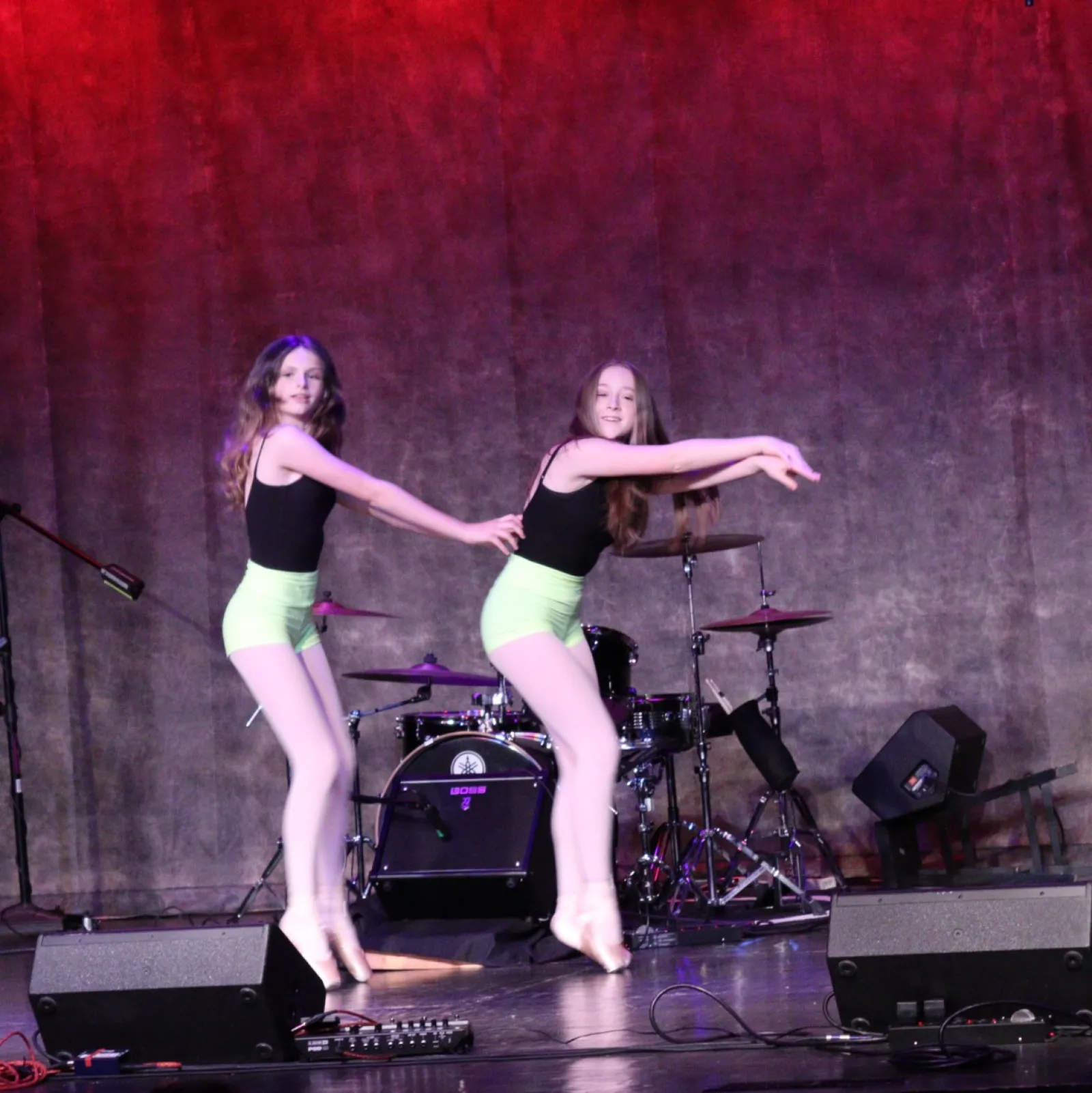 a group of women on a stage