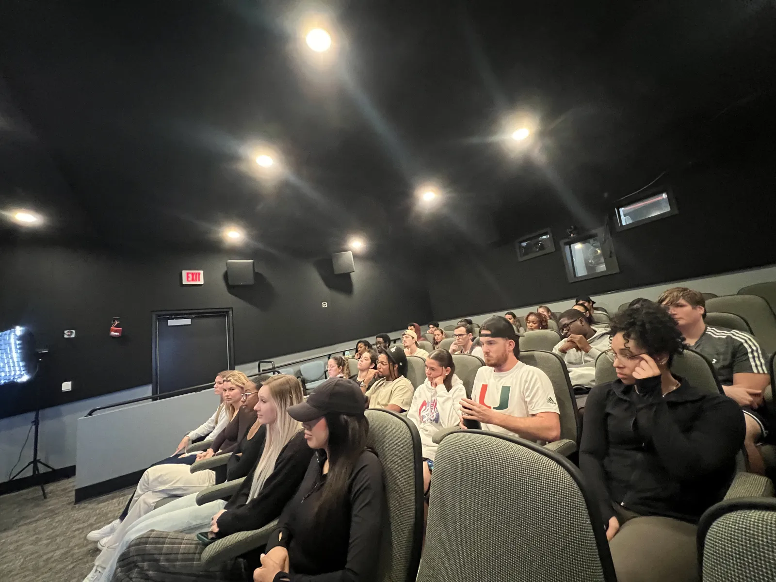 a group of people sitting in a room