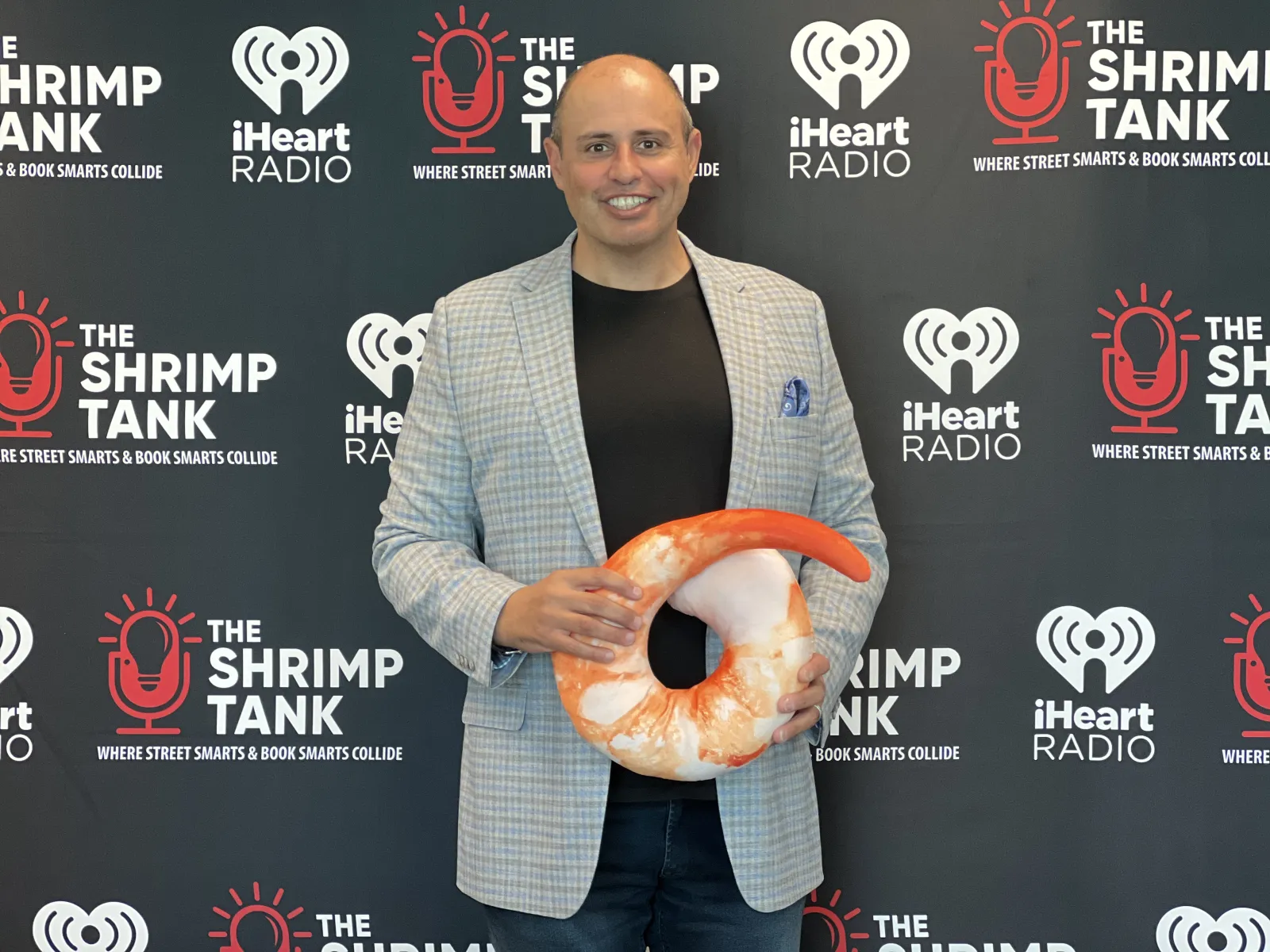 Corey Saban holding a large snake