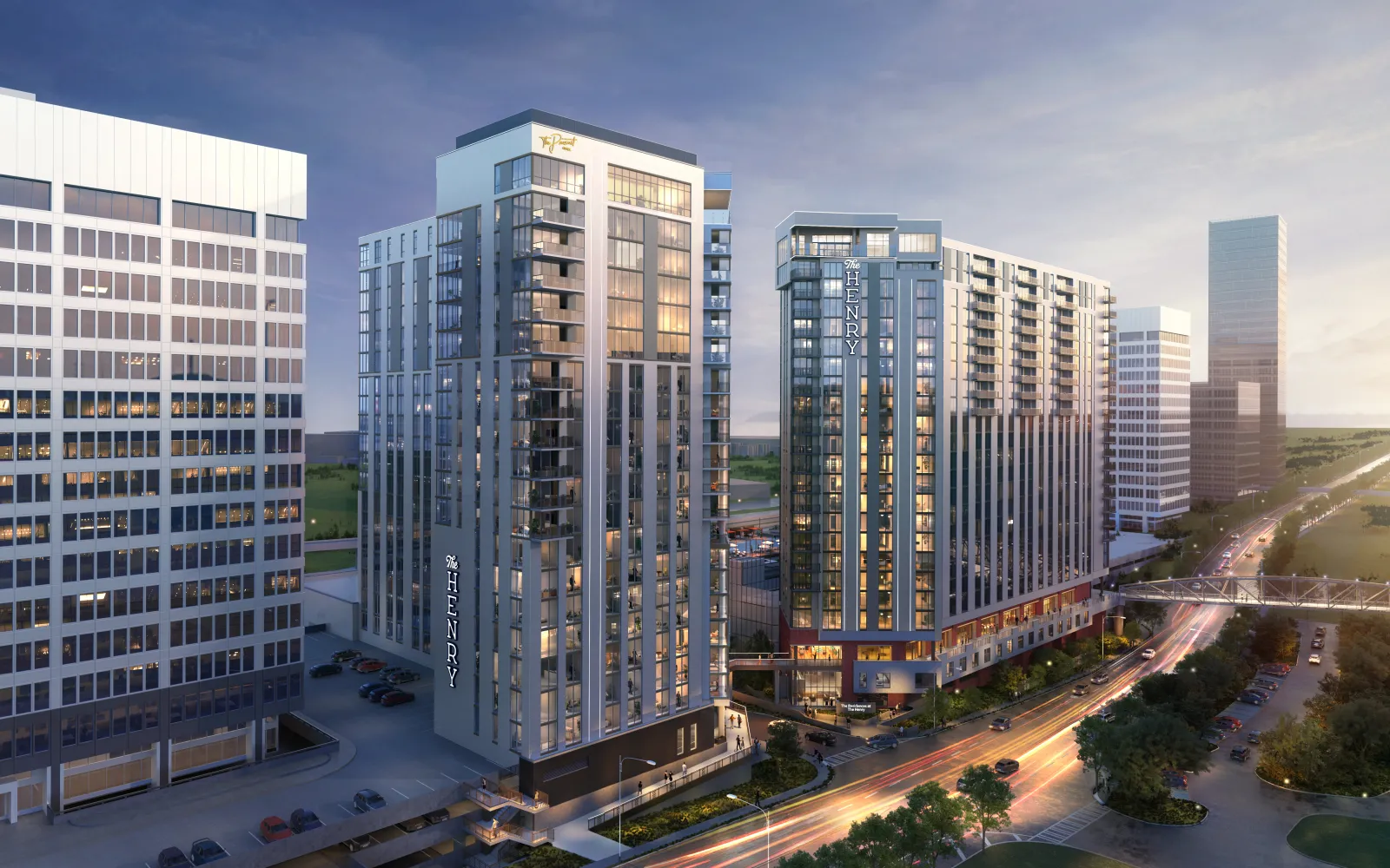 Modern high-rise residential buildings with glass balconies and illuminated windows at dusk in an urban cityscape.