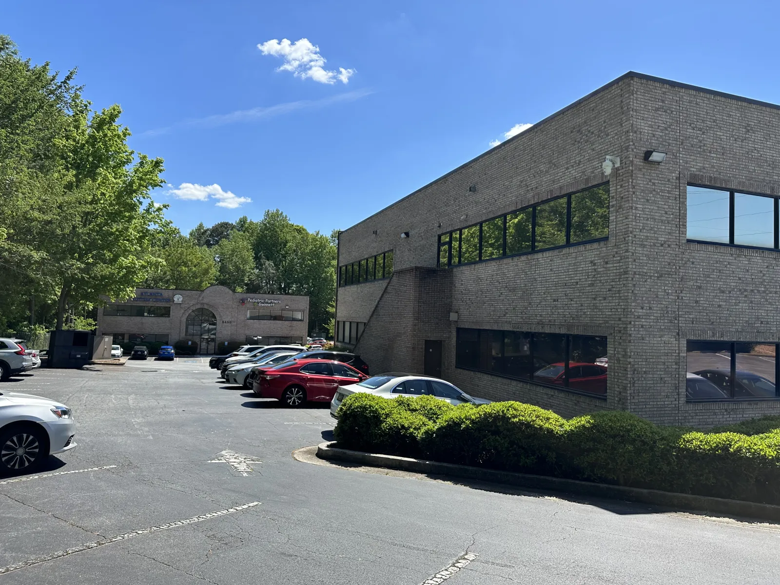 a building with cars parked outside