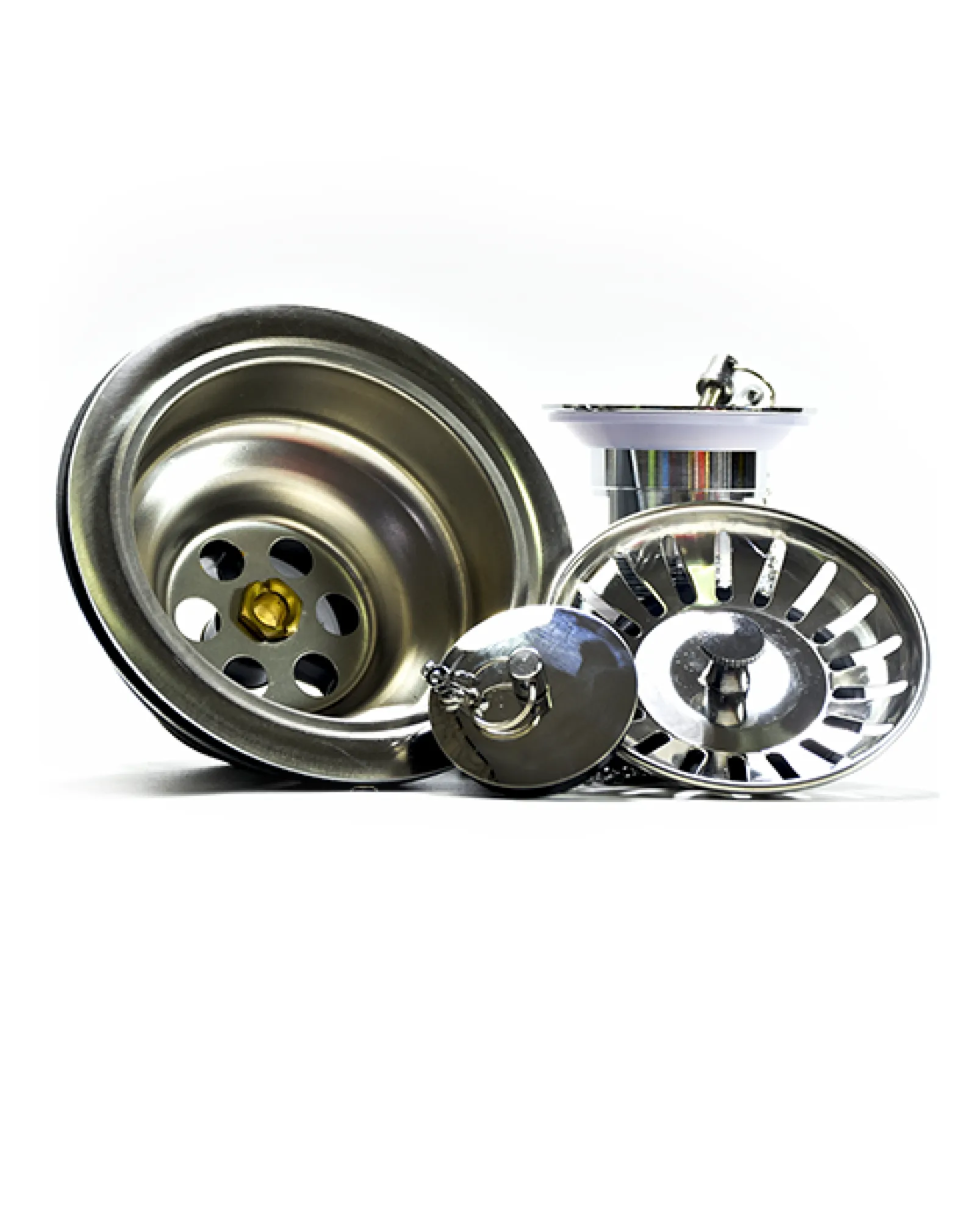 Assorted stainless steel kitchen sink components including strainers and plugs.