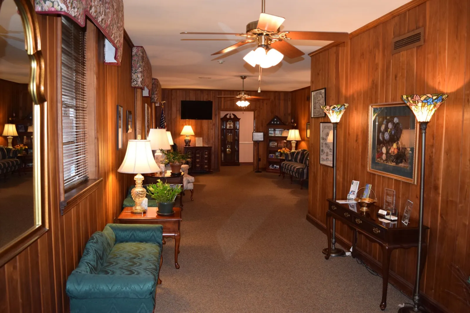 a living room filled with furniture and a fireplace