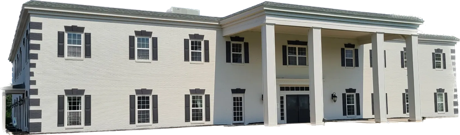 a white building with black shutters