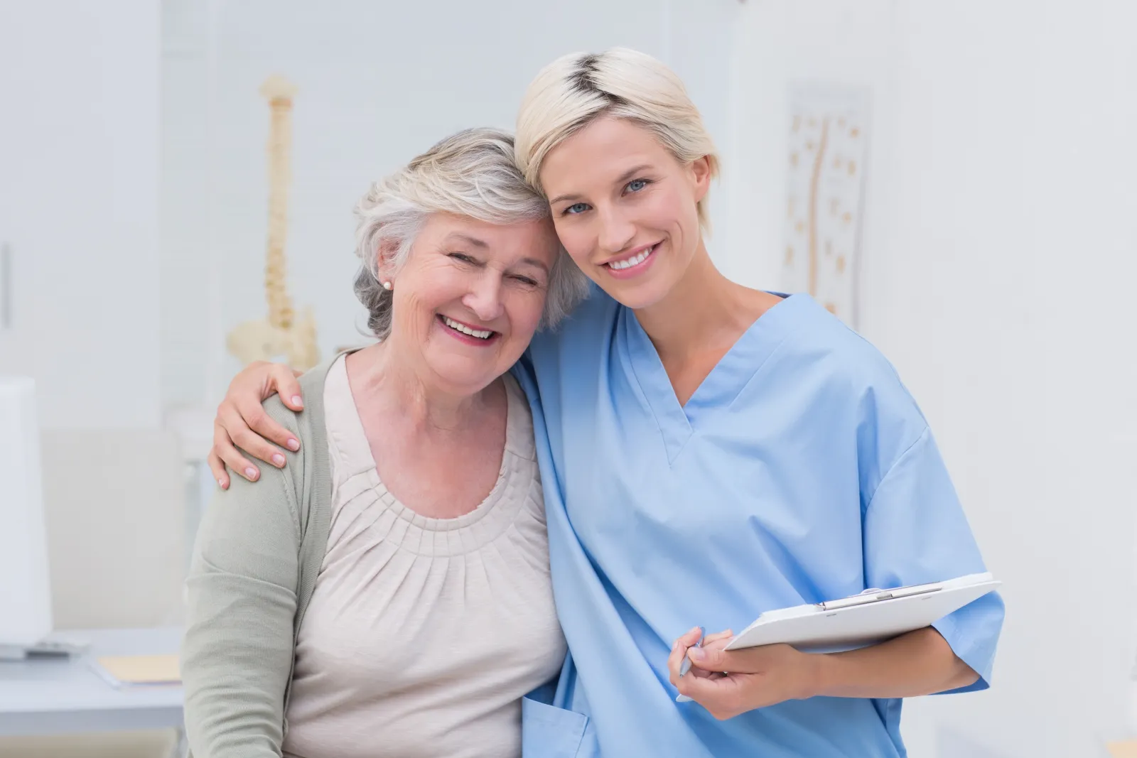 doctor with arm around patient