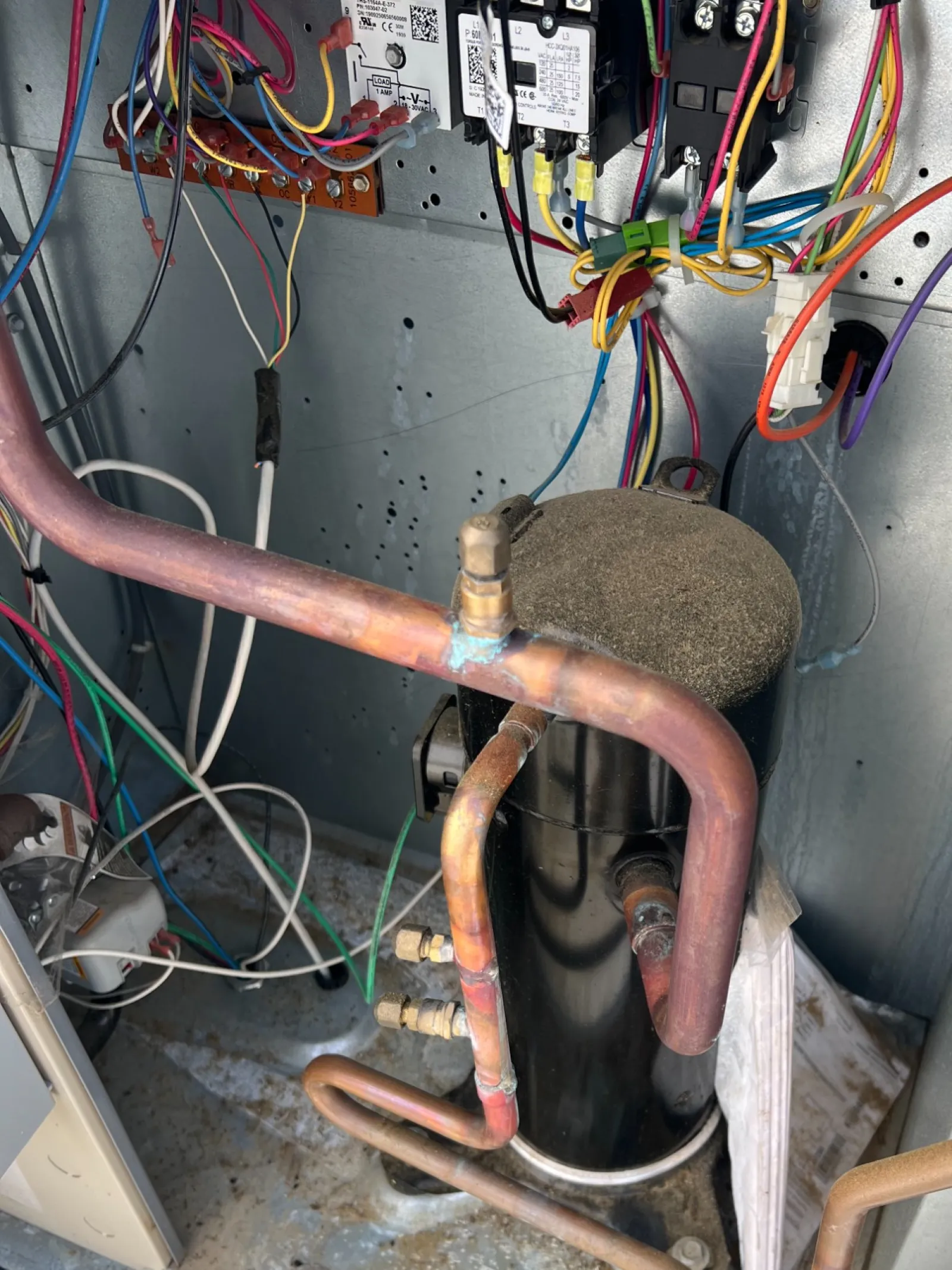 Commercial HVAC Repair and Maintenance on an RTU by The Air Company of GA.