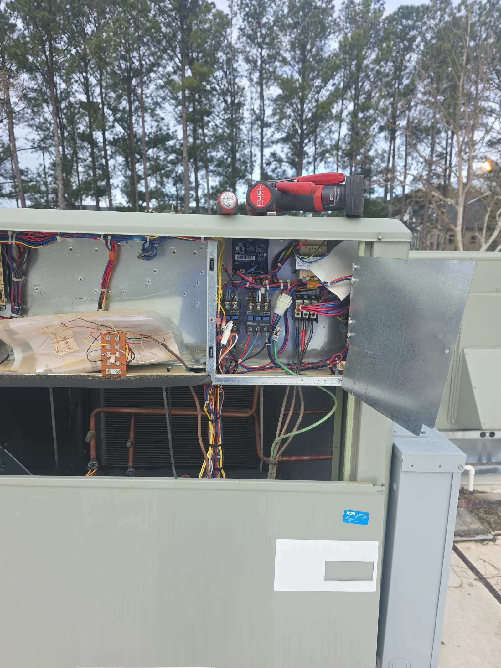 Commercial HVAC Repair and Maintenance on an RTU by The Air Company of GA.