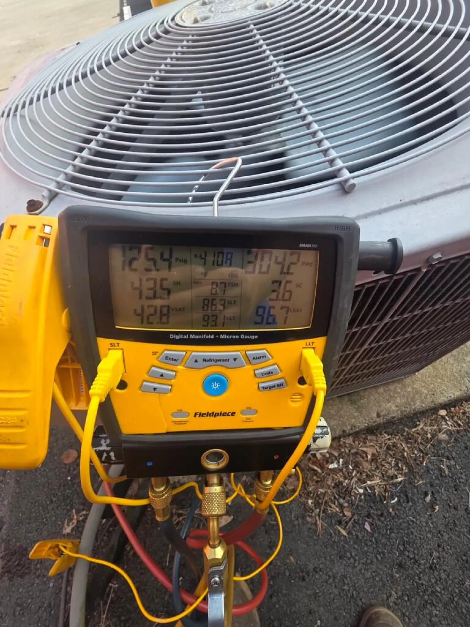 Gauge connection to outdoor hvac unit in East Cobb 30067 repaired by The Air Company of GA