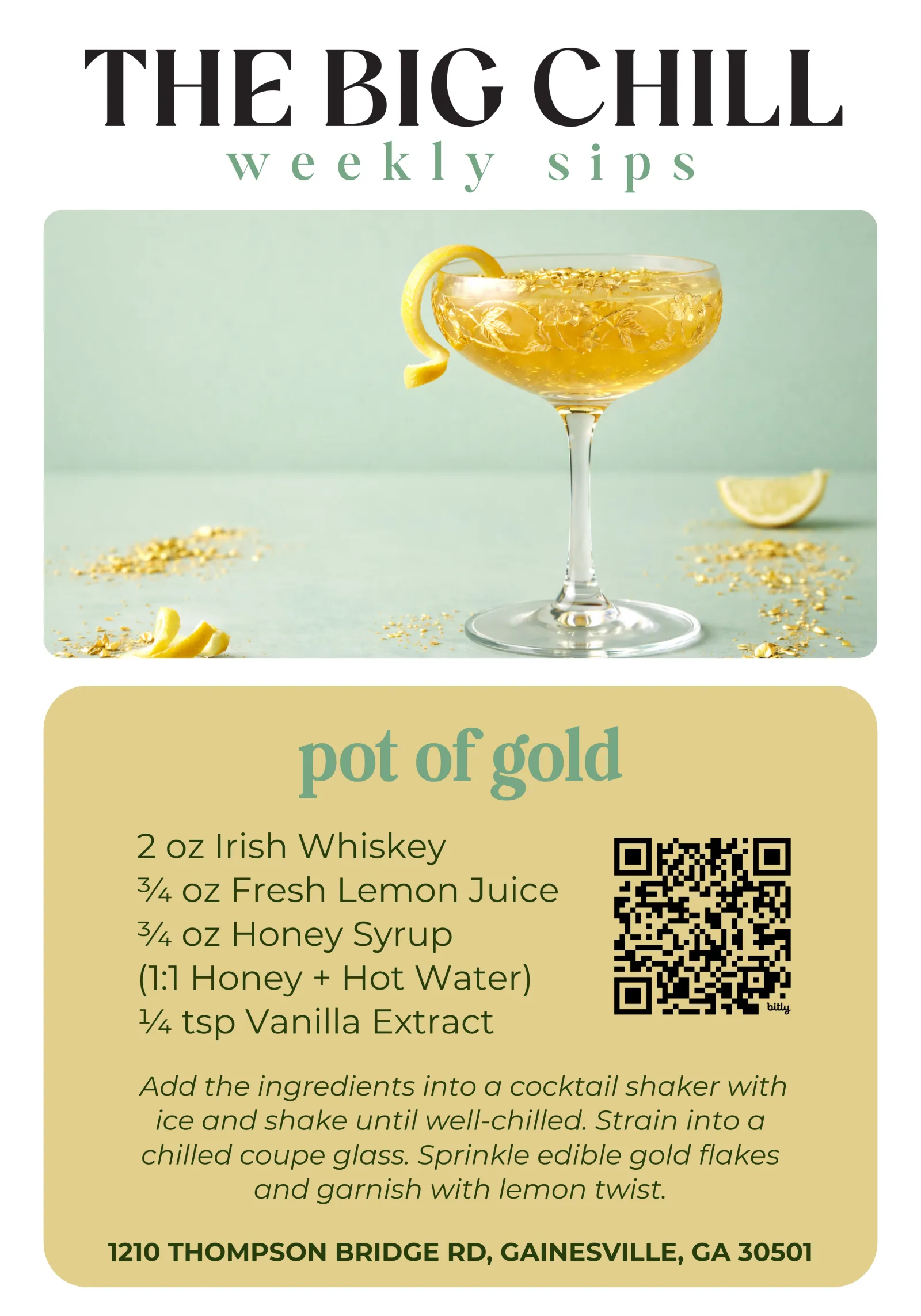 Elegant Pot of Gold cocktail in etched coupe glass garnished with lemon twist and edible gold flakes on mint background.